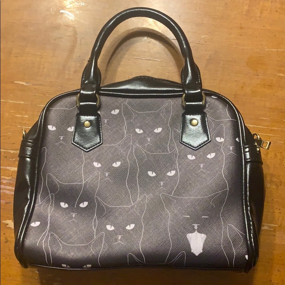 Emily the Strange purse with extra straps